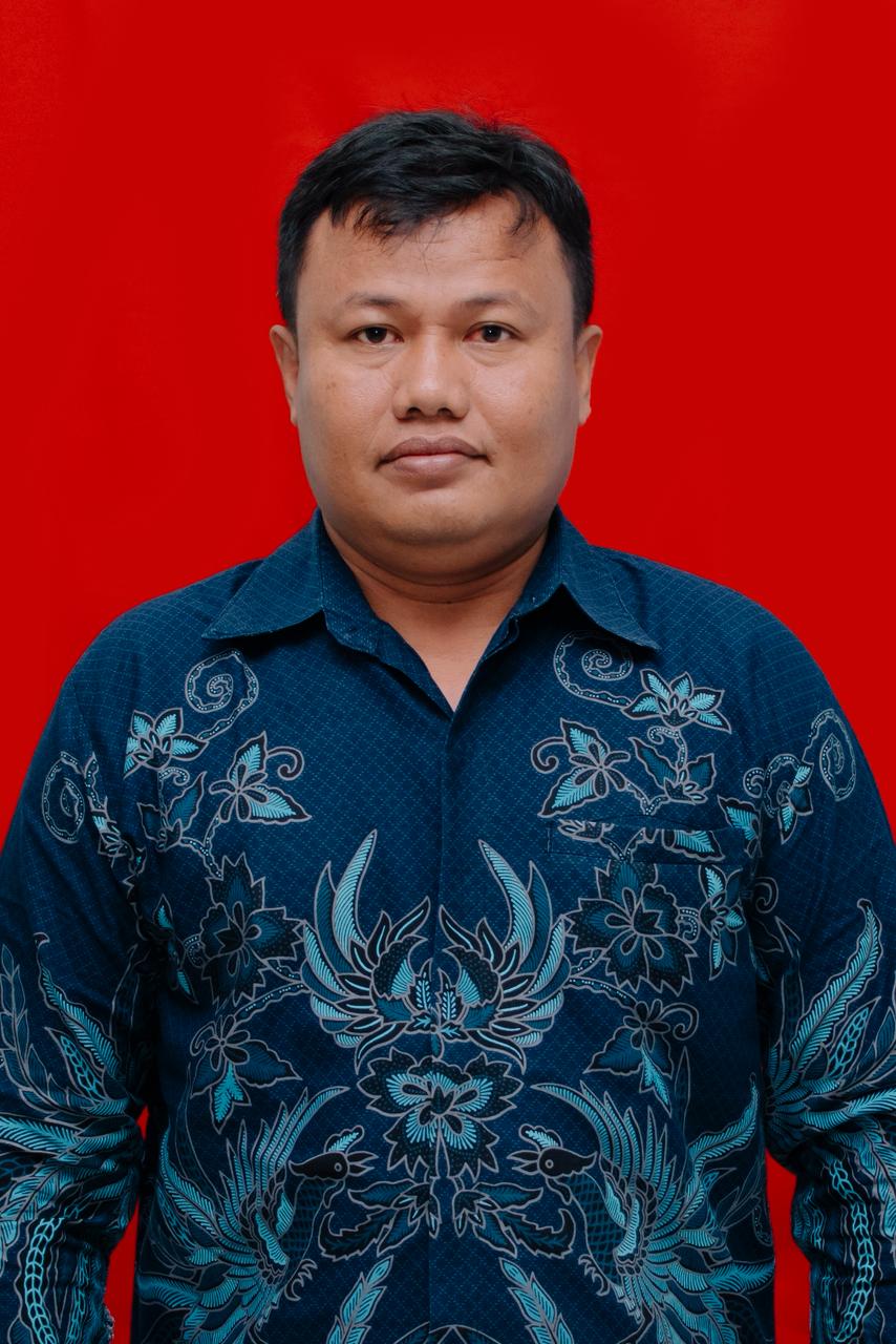 Edi Putra Sihombing, S.Pd. (Guru Fisika kelas XII)
